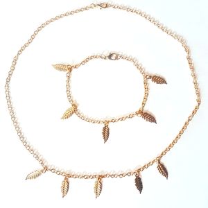 Gold Feather Necklace And Bracelet